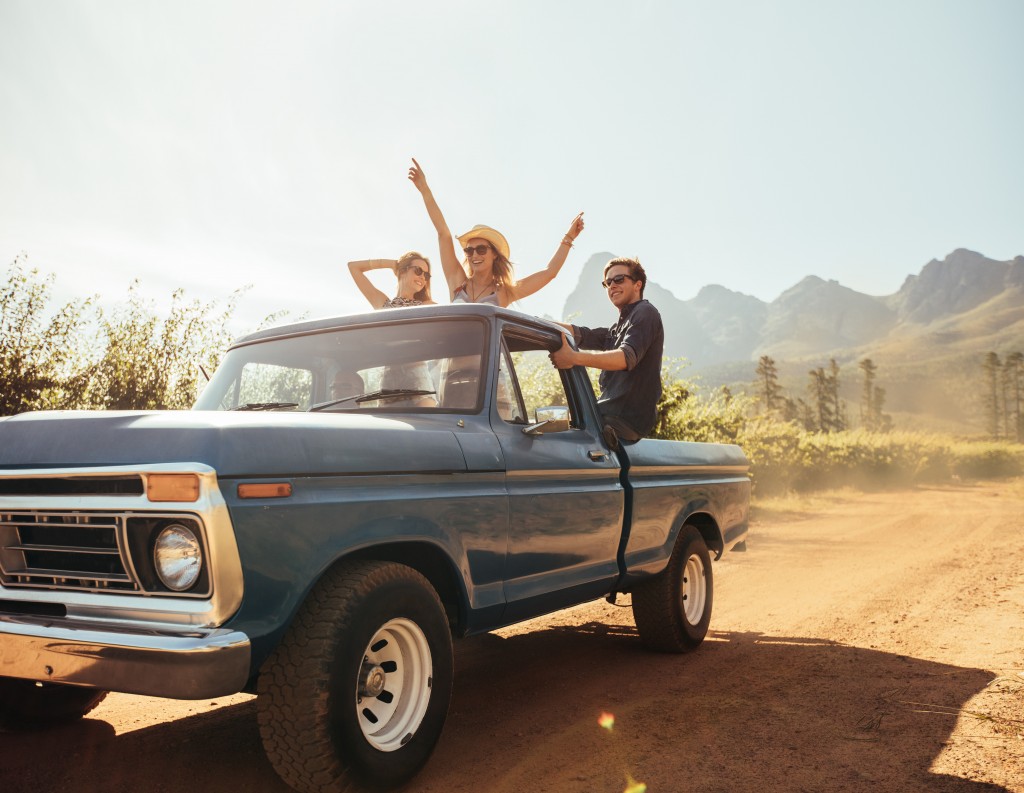 Friends on a pick up truck