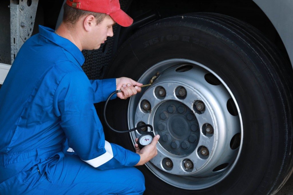 a man checking the tires