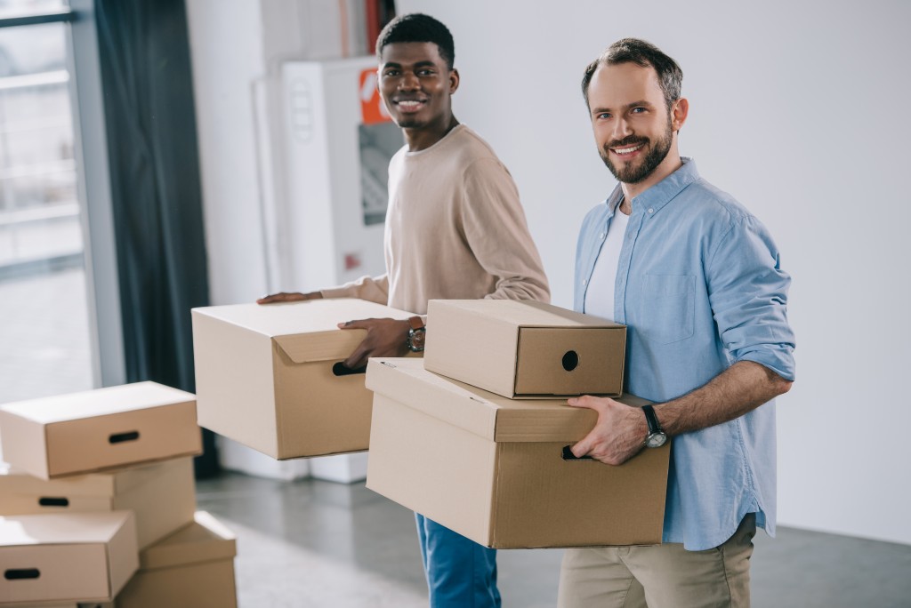 men carrying boxes