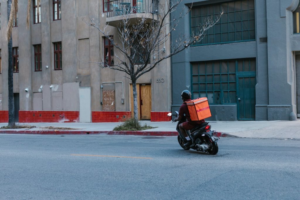 delivery guy on his way to deliver his parcel